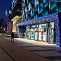 Световое оформление входной группы фасада здания торгового центра «River Mall», Киев Световое оформление входной группы фасада здания торгового центра «River Mall», Киев